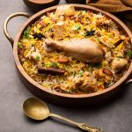 Restaurant style Spicy Chicken Biryani served with Raita and Salan, Popular Indian or Pakistani non vegetarian Food